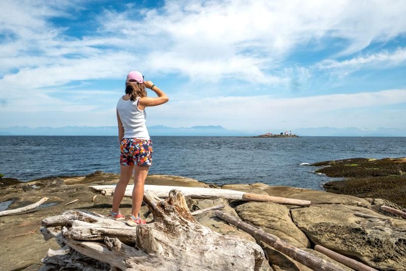 A girl standing on a Island in BC, Canada