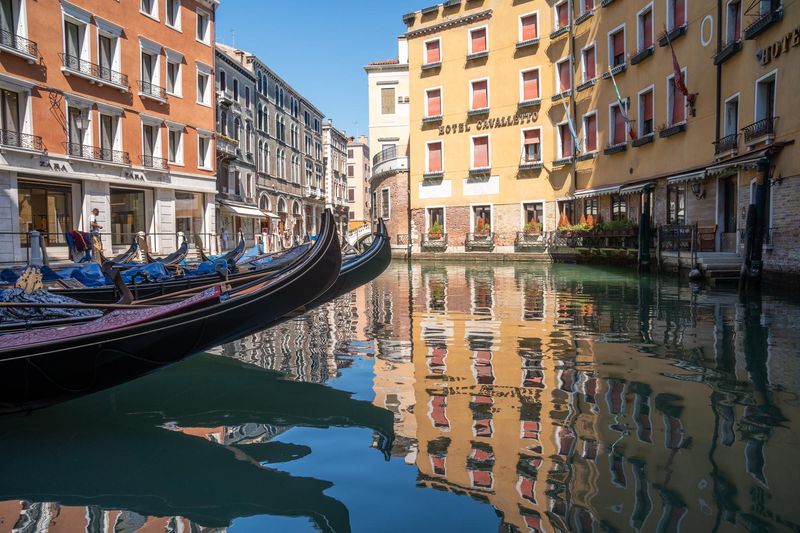 Gondolas parked in Venice canals